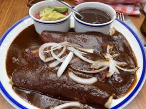 Enchiladas with mole sauce  at La Cueva del Chango in Playa Del Carmen
