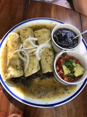 Mushroom enchiladas with green sauce   at La Cueva del Chango in Playa Del Carmen