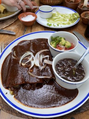3 enchilada in mole  at La Cueva del Chango in Playa Del Carmen