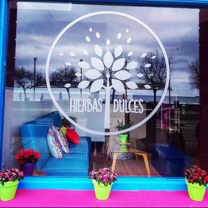 Entrance sign at Hierbas Dulces in Gijon