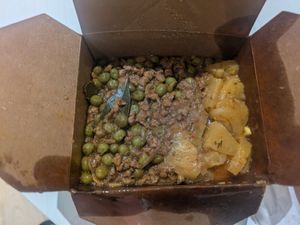 Too good to go meal (lentil curry, pineapple, rice, peas) at PlantXology in East London