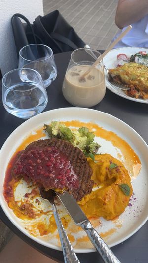 Seitan steak with lingonberry sauce and root vegetables purée at Novabistro in Minsk