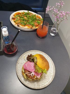 Nova burger and pepperoni pizza at Novabistro in Minsk