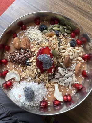 Papaya and pineapple based smoothie bowl   at Gaia in Rishikesh