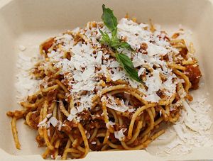 A large plate of GF spaghetti with your choice of protein, sauce & cheese. at Plant Base Cafe in Santa Fe