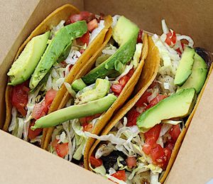 Taco Box3 tasty tacos with your choice of protein, cheese, sauce, and tortilla. Topped with fresh garnish & avocado. If you choose GF Tortillas it's only 2 tacos, but they are huge at Plant Base Cafe in Santa Fe