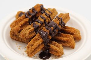 Churros
Fried Gluten-Free dough, rolled in coconut sugar and cinnamon. Served with a sugar-free chocolate sauce! at Plant Base Cafe in Santa Fe