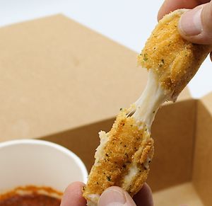 Mozzarella Sticks             
Lightly GF battered & fried vegan organic mozzarella cheese served with your choice of dipping sauce. at Plant Base Cafe in Santa Fe