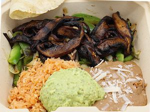 Portobello Fajitas
Marinated & grilled organic portobello fajita strips, over a bed of organic grilled onions & bell peppers. Served with rice, refried pinto beans, fresh garnish at Plant Base Cafe in Santa Fe