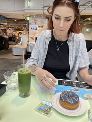 She likes the donut   at 2foods - Shibuya Loft in Tokyo