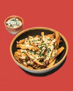 Cheesy fries  at Nosh in Lisbon