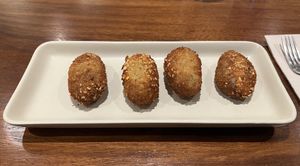Black Truffle and Pea Croquettes - 8.5/10  at PÖTSTOT in Barcelona