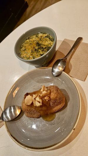 Flan de coco y mango y leche frita  at PÖTSTOT in Barcelona