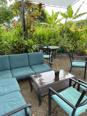 Patio seating covered from the rain at Maui Garden Grove Cafe in Haiku