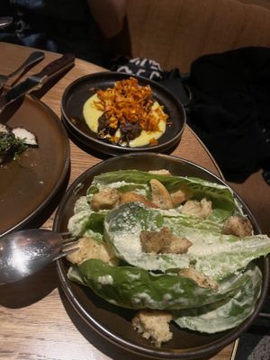 Caesar salad and mutton skewers on a corn purée    at Lona Misa in South Yarra