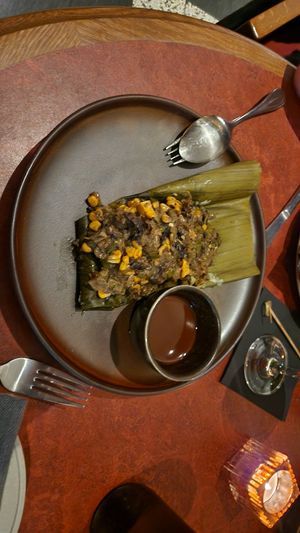 Tamales with corn and cantus salsa and chilli chocolate sauce at Lona Misa in South Yarra
