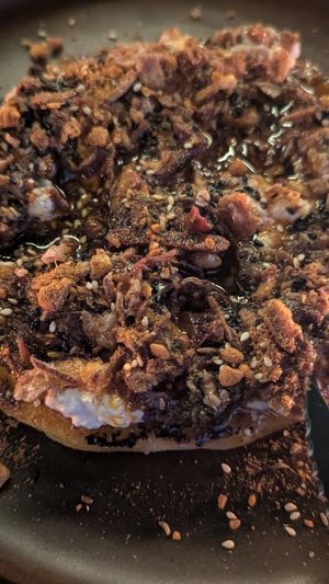 PAN CON QUESO FRESCO
WOOD FIRED FLAT BREAD,SERVED WITH
FERMENTED HOUSE CHEESE CURD, DUKKAH &
SALSA MACHA at Lona Misa in South Yarra