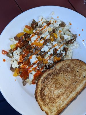 Create your own scramble (tofu, mushroom, onion, peppers, veggie sausage) - I added hot sauce at Cafe This Way in Bar Harbor