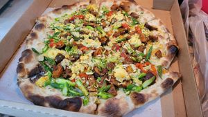 13" pizza, $18 plus tax and gratuity at Farina Pizzeria & Wine Bar in Albuquerque