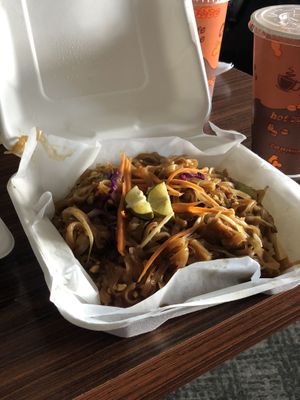 Pad Thai with Thai ice tea in the background  at Thai Vegan in Albuquerque