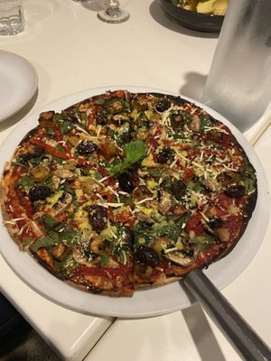 Pizza with Kumara and olives   at UMU in Coromandel
