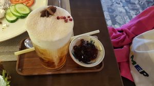 Black tea macchiato at Vi Que Kitchen in Ho Chi Minh City