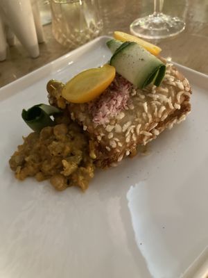 Tunnel of love, loved the fried dough and chickpea mixture, raw zucchini and tomato not so much?   at Vrindaa in Rome