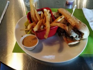 Vegan Italian beef with fries and awesome sauce. at Tiger Lily Cafe in Chesterton