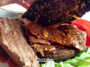 Inside the panini...they use Upton's Natural 'Bacon' Seitan....very tasty! at Tiger Lily Cafe in Chesterton