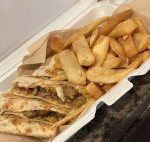Jerk chicken quesadillas and steak fries  at Bar Vegan ATL in Atlanta