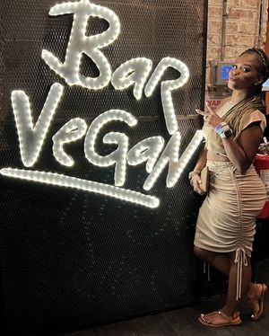 Inside at the selfie wall  at Bar Vegan ATL in Atlanta