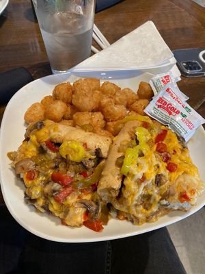 Mushroom cheesesteak + totz   at Bar Vegan ATL in Atlanta