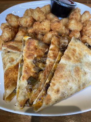 Jerk chick’n quesadilla and tater tots  at Bar Vegan ATL in Atlanta