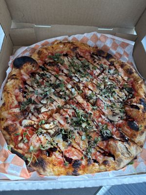 Vegan cheese, basil, micro greens, mushrooms, garlic and balsamic drizzle. I asked for a side of marinara also.   at Marty McPies in Corpus Christi