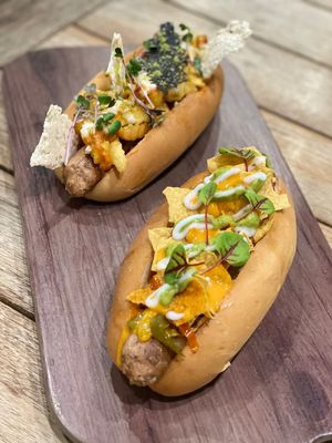 1. Classic Brooklyn
Plant-Based Hot Dog, Garlic Sauce, Fries, Cheese & Leaves.

2. 
Tex-Mex
Plant-Based Hot Dog, Pepper Relish, Nachos, Cheese, Jalapeños, Guacamole & Leaves at Just Vegan - Jumeriah in Dubai