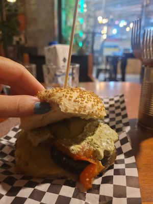 Burger with avocado sauce, vegan cheese and more at La Golosa Vegan Vurger in Barcelona