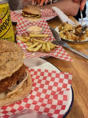 Not Chicken burger and vecon burger in the distance at La Golosa Vegan Vurger in Barcelona