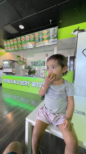 My daughter enjoying a vegan muffin  at Veg & Go Plant Based in Riverside