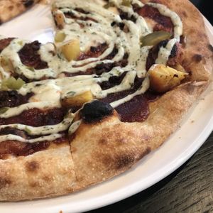 Hawaiian pizza with canned pineapple. at PLANTA in West Palm Beach