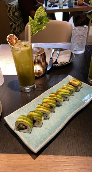matcha mojito (virgin cocktail) and a dragon roll! at PLANTA in West Palm Beach