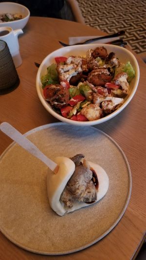 Bao Slider (chick 'n fried mushrooms, hoisin, pickled cucumber), Habibi Bowl (roasted cauliflower, falafel, tahini , sunflower vinagrette) at PLANTA in West Palm Beach