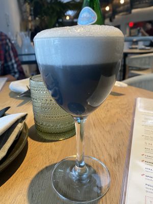 Bourbon and charcoal cocktail #Veganuary at PLANTA in West Palm Beach