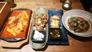 tteok bokki, cauliflower wings, kimchi mandu, champions at Kini in Hamburg