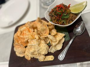 Eggplant Goreng Dip with Emping Cracker  at National Kitchen by Violet Oon in Central Singapore