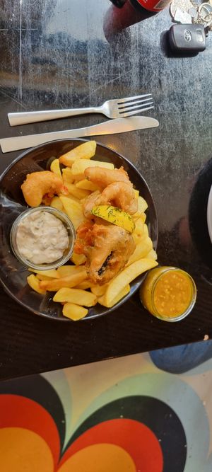 Tofish & scampi mix with a side of curry at Scoff's in Horsforth