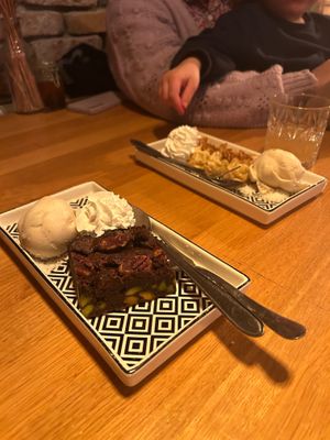 Brownie (front) and Apple cinnamon gyoza. Both with cinnamon ice cream at WIT-LOF in Den Burg