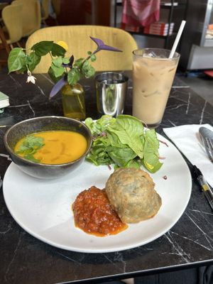 “Samosa & Soup” - carrot soup, saag samosa, salad. Almond iced chai masala.  at PONDiCHERi Bake Lab in Houston