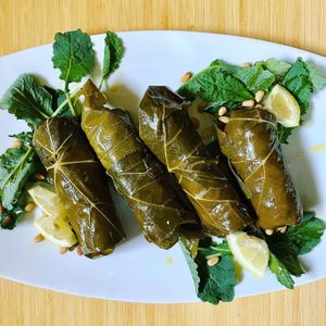 Dolmas with tahini vinaigrette and shiitake mushrooms.
 at Tilth in Seattle