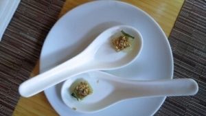 Vegan Amuse-Bouche of Compressed Cucumber with Toasted Sesame Seeds and Lemon at Tilth in Seattle