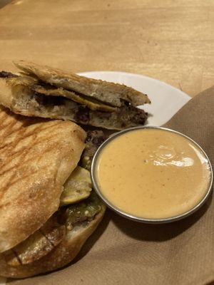 Black bean and plantain panini with vegan spicy mayo  at La Graine Brulée in Montreal